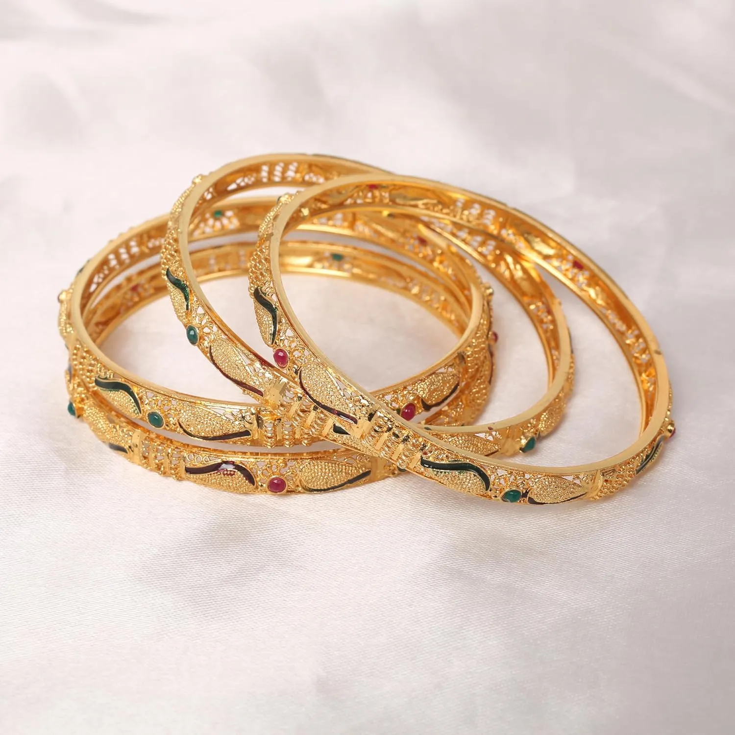 Touchstone Golden Bangle Collection Indian Bollywood Desire Beautifully Carved Conch Shell Inspired Thick Designer Jewelry Bangle Bracelets. Set of 4. in Gold Tone for Women